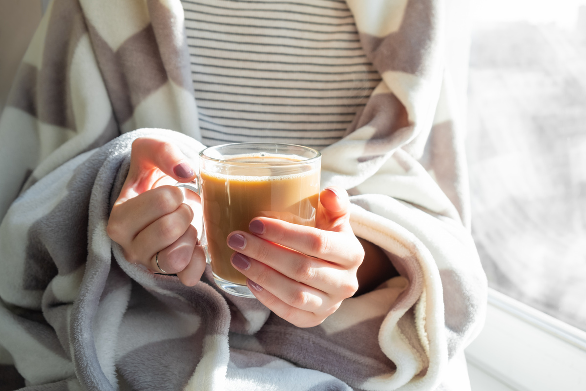 Hot Coffee in Woman's Hands